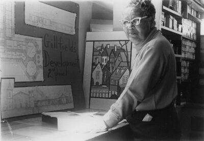 Amaza Lee Meredith looking over drawings of an addition to the Gillfield Baptist Church in Petersburg, Va., 1964, Virginia State University Special Collections and Archives
