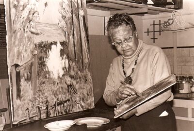 Amaza Lee Meredith painting in her studio, the “Wreck Room,” at Azurest South, which she converted from her garage in 1959. Virginia State University, Special Collections and Archives
